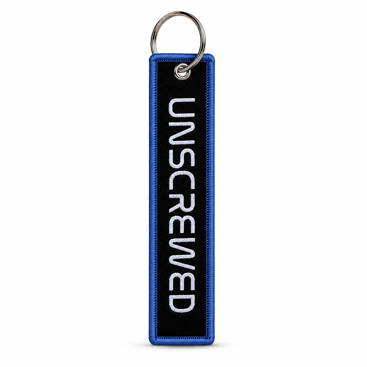 Black embroidered keychain tag with blue border and white "Unscrewed" lettering, attached to a metal split ring.