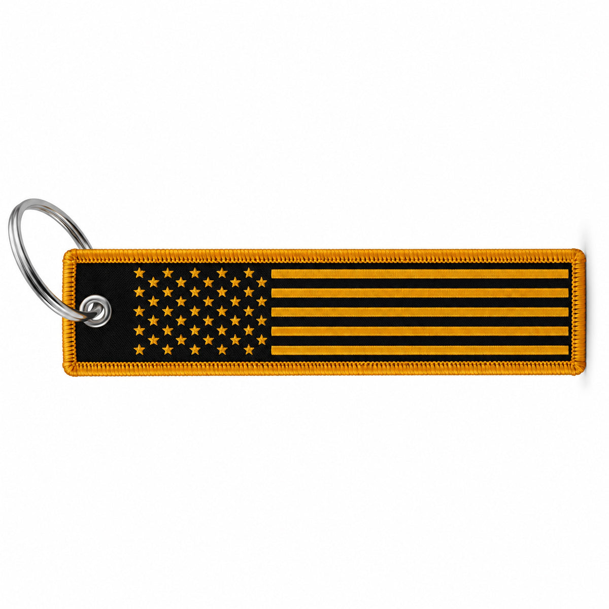 A rectangular keychain tag featuring a black and gold American flag design with a silver metal split ring, shown on a plain white background.